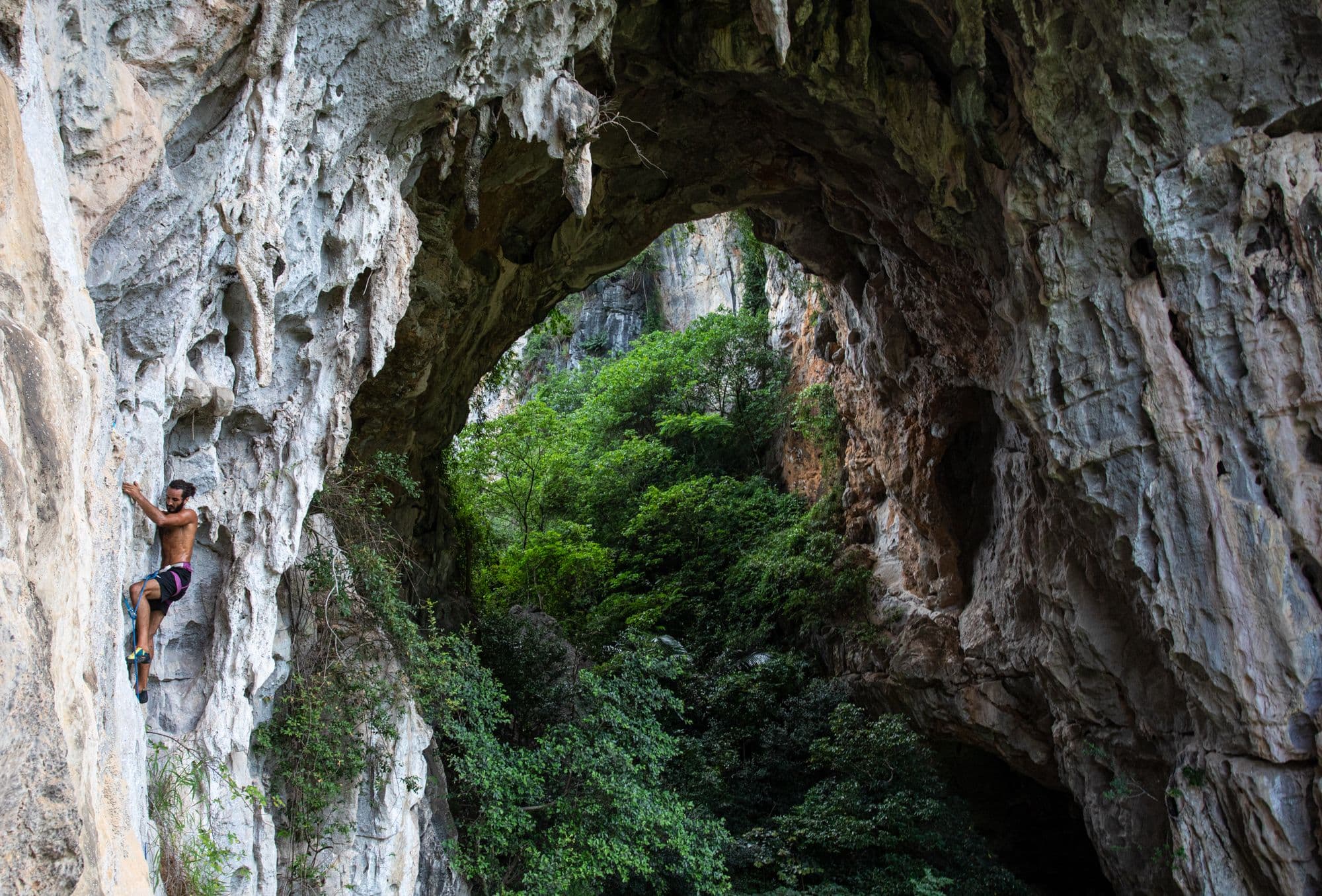 a climber from Hanoi climbing at the Arch, a geological wonder in Huu Lung. Bolted in 2013 by Jack Crivelli and Jean Verly