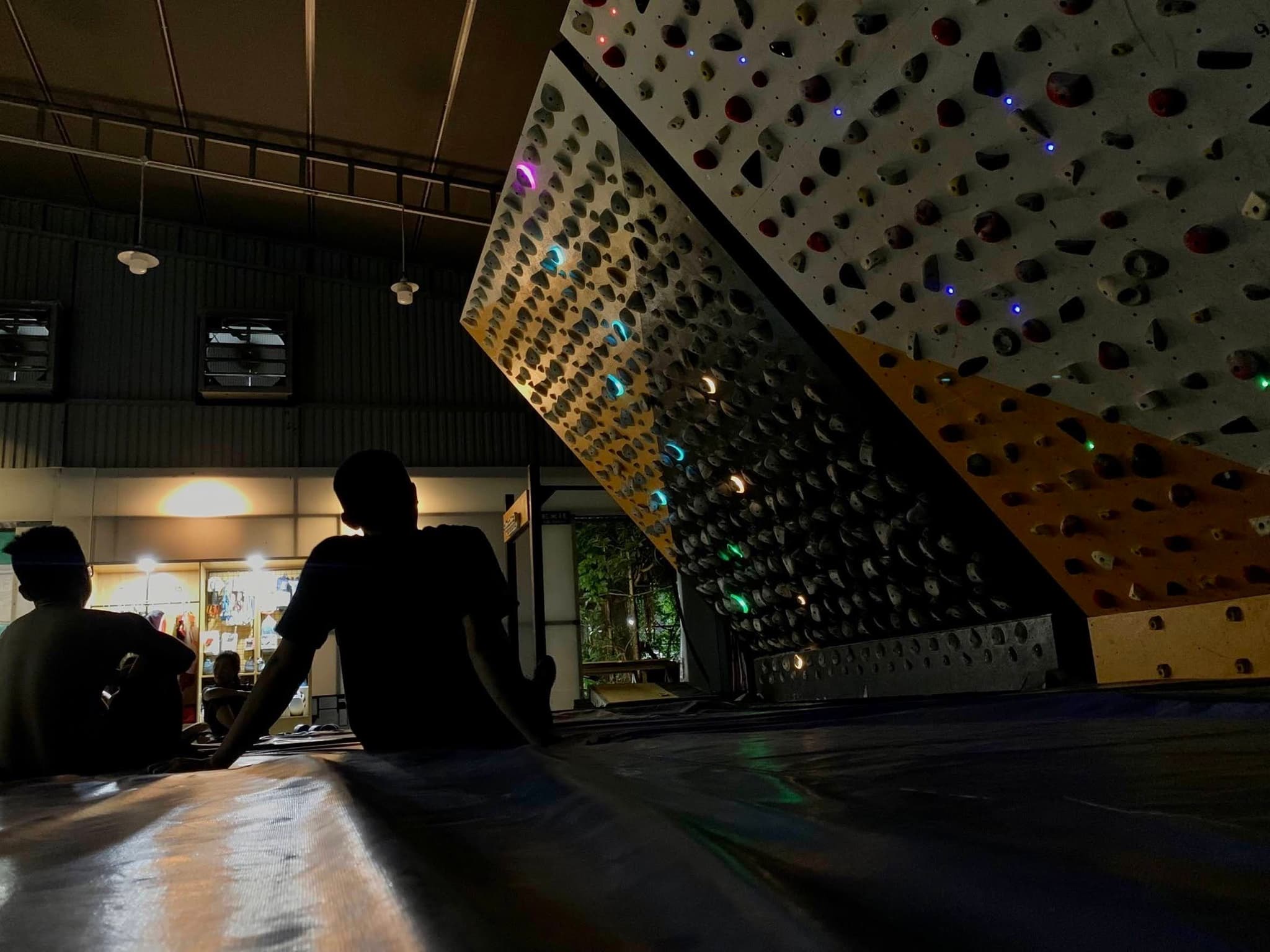 VietClimb members enjoying a late kilterboard session in Hanoi